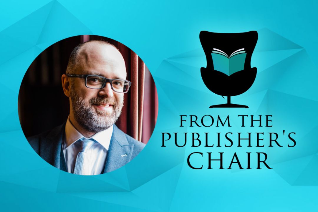 Joshua Tallent in the Publisher's Chair